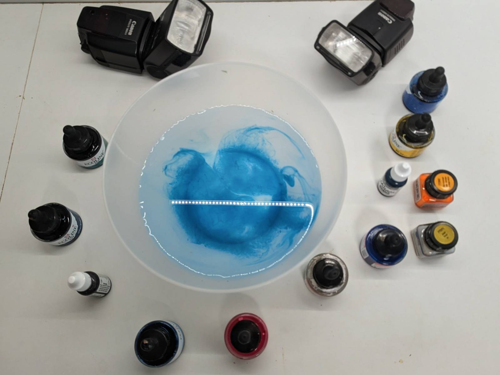 Overhead view of bowl with inks